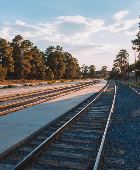 View of the Grand canyon railway station during a cloudy day background A view of the Grand canyon railway station during a cloudy day background